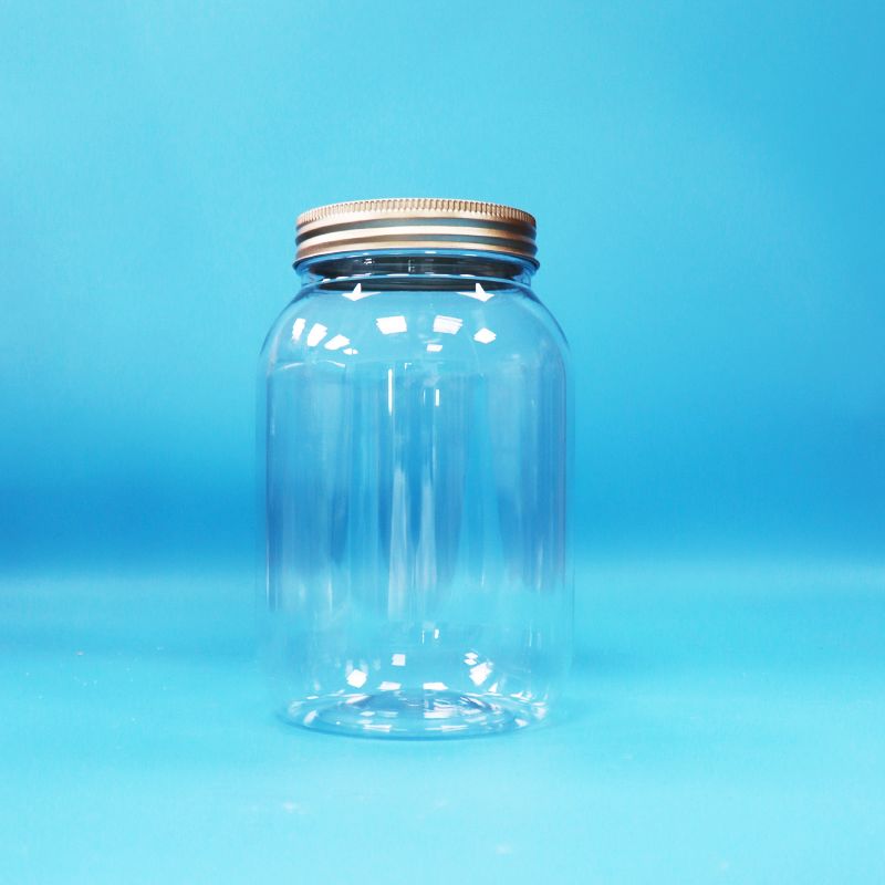 Makanan Kelas Jelas PET Plastik Bulat Jar Aluminium Sekrup Flat Cap Untuk Makanan Permen Kacang