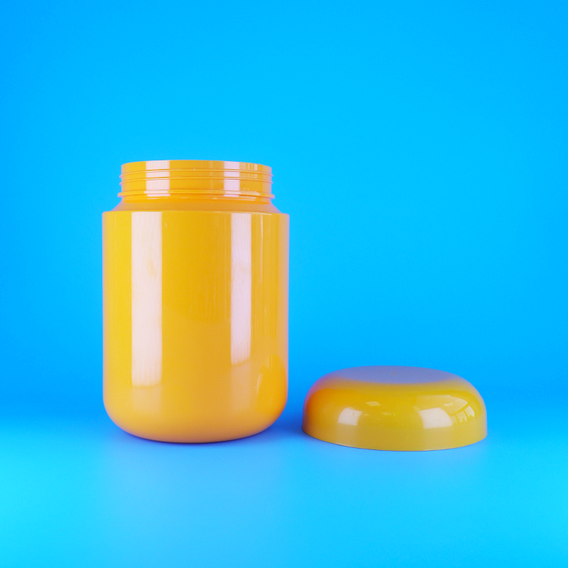 Toples Permen Plastik PET Oranye Food Grade Bentuk Bulat dengan Tutup Ulir Datar Oranye